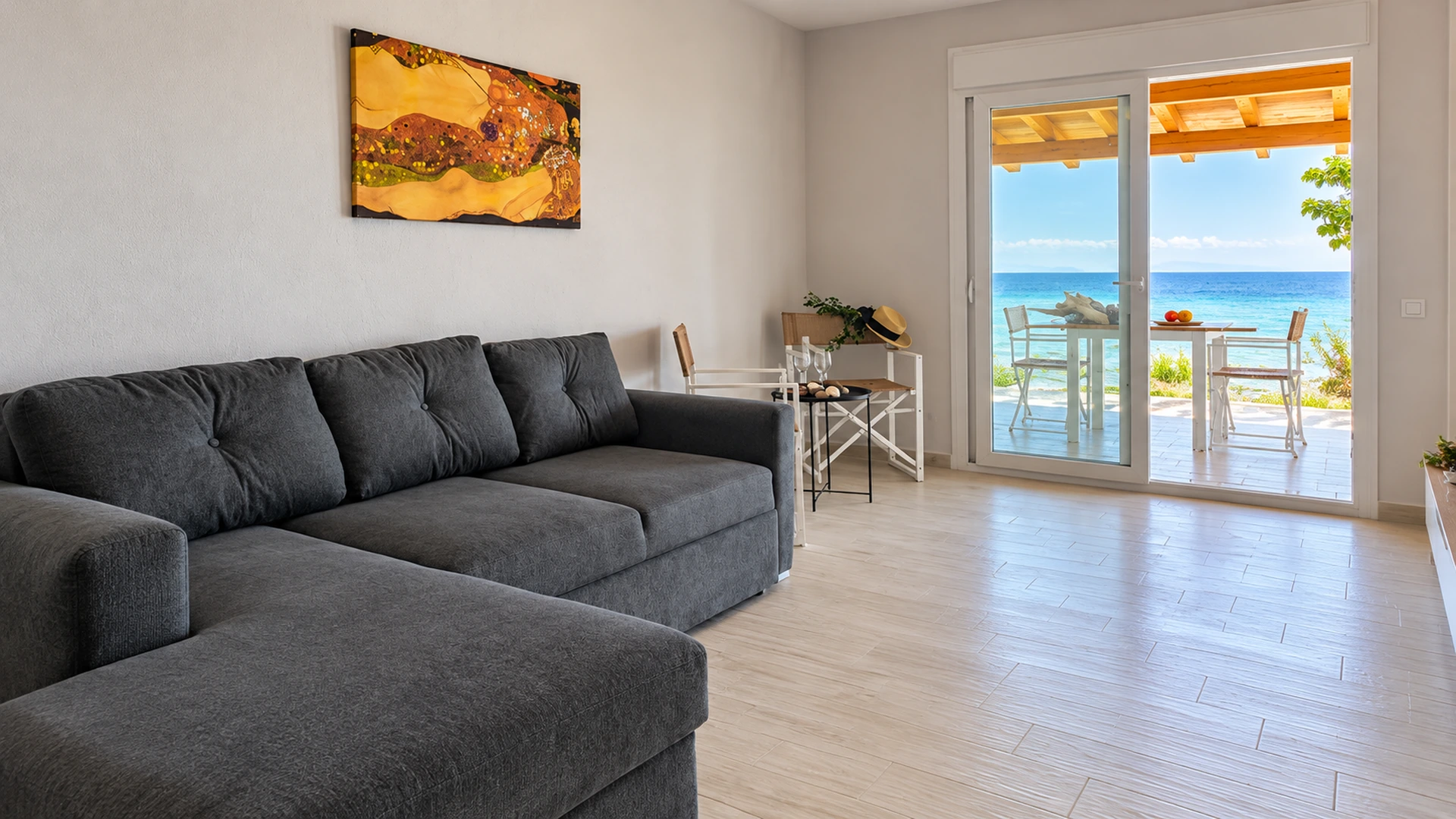 Living room with sofa and sea view